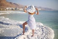 Young woman on Dead Sea Royalty Free Stock Photo