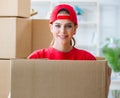 Young woman delivering boxes of personal effects