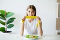 Young woman on a diet, eats only salad and tries to lose weight Royalty Free Stock Photo