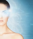 Young woman with a digital hologram on her eye Royalty Free Stock Photo