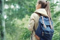 young woman discovering nature in the forest environment, lifestyle concept