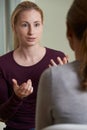 Young Woman Discussing Problems With Counselor Royalty Free Stock Photo