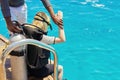 Young woman diver preparing for scuba diving Royalty Free Stock Photo