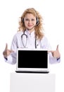 Young woman doctor laptop sign