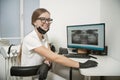 Girl radiologist in the dentist`s office