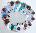 young woman doctor standing in front of her happy colleagues Royalty Free Stock Photo