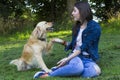 Young woman and dog in forest