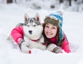 Young woman with dog winter outdoors fun