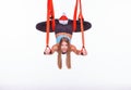 Young woman doing anti-gravity aerial yoga in Royalty Free Stock Photo