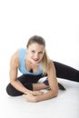 Young Woman Doing Floor Stretching Excercises Royalty Free Stock Photo