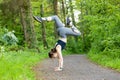 Young woman doing a handstand as a fitness workout Royalty Free Stock Photo