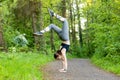 Young woman doing a handstand as a fitness workout Royalty Free Stock Photo