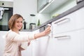 Young woman doing housework Royalty Free Stock Photo