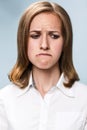 Young woman doing a pout expression Royalty Free Stock Photo