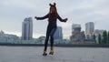 Young woman doing professional elements on roller skates outdoor in slow motion.
