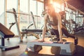 Young woman doing push-ups on exercise stepper in the gym Royalty Free Stock Photo