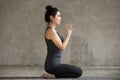 Young woman doing seiza exercise