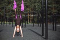 Young woman doing stretching outdoors. Fitness, stretch, balance, exercise and healthy lifestyle people. Royalty Free Stock Photo