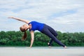 Young woman doing yoga exercise on mat02 Royalty Free Stock Photo