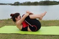 Young woman doing yoga exercise