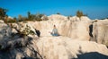 Young woman doing yoga exercises outdoor in the white mountains. Relax yoga at the top of the mountain Royalty Free Stock Photo