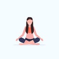 Young woman doing yoga exercises smiling sport fitness girl sitting lotus pose meditation relaxation concept full length