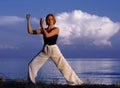 Young woman doing yoga outside