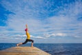 Young woman doing yoga pose Royalty Free Stock Photo