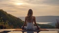 Young woman doing Yoga and stretching muscle in morning, wellness, fitness, Vitality, healthy girl meditation against mountain Royalty Free Stock Photo