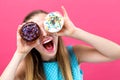 Young woman with donuts