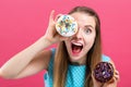 Young woman with donuts