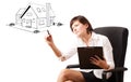 Young woman drawing a house on whiteboard Royalty Free Stock Photo