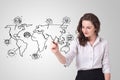 Young woman drawing a social map on whiteboard Royalty Free Stock Photo