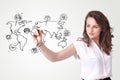 Young woman drawing a social map on whiteboard Royalty Free Stock Photo