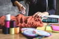 Young woman dressmaker or designer working as fashion designers