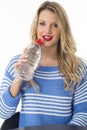 Young Woman Drinking Bottle of Still Mineral Water Royalty Free Stock Photo