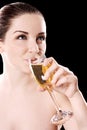 Young woman drinking champagne Royalty Free Stock Photo