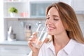 Young woman drinking clean water from glass Royalty Free Stock Photo