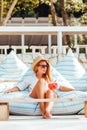 Young woman drinking cocktail in a beach bar Royalty Free Stock Photo