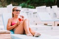 Young woman drinking cocktail in a beach bar Royalty Free Stock Photo