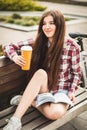 Young woman drinking coffee on a bicycle trip Royalty Free Stock Photo