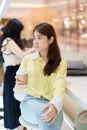 young woman drinking coffee, female hand holding and enjoying a cup of tea at cafe shop Royalty Free Stock Photo