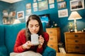 Young woman drinking coffee/tea, spending free time home.Hot beverage for health.Self care,staying home,quarantine.Self-isolation Royalty Free Stock Photo