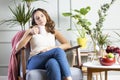 Young woman drinking a cup of coffee