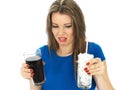 Young Woman Drinking High Sugar Fizzy Drink Royalty Free Stock Photo