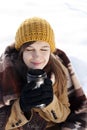 Young woman drinking hot drink outdoors Royalty Free Stock Photo