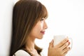 Young Woman drinking hot latte coffee Royalty Free Stock Photo