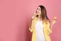 Young woman drinking lemon water on background. Space for text Royalty Free Stock Photo