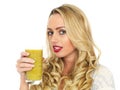 Young Woman Drinking Mango Fruit Juice Royalty Free Stock Photo