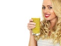 Young Woman Drinking Mango Fruit Juice Royalty Free Stock Photo